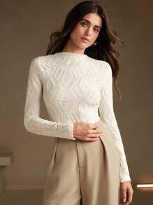 Blusa texturizada manga larga